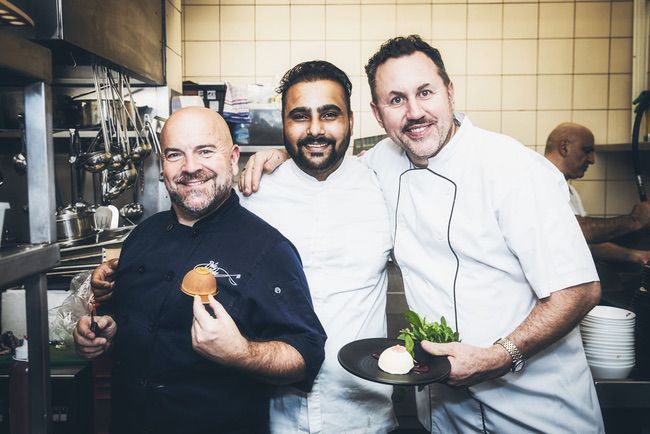 chef posing with food